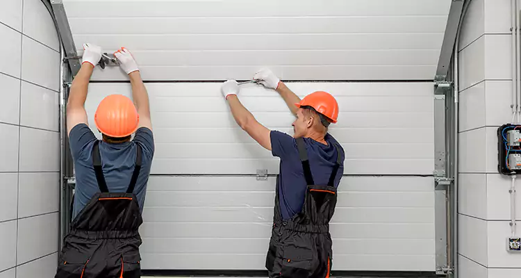 Garage Door Bottom Panel Repair in Florida Ridge, FL